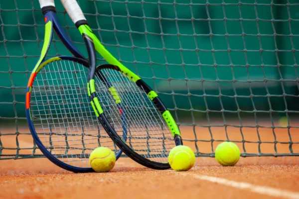 Your Complete Guide to Tennis Equipment and Tennis Training Equipment for Every Player Player choosing the high-quality tennis equipment and tennis training device from a smartly organized courtroom-facet show